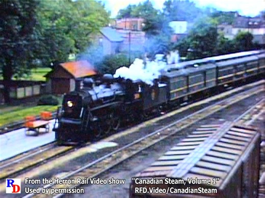 A Canadian National passenger train rolls into Palmerston, Ontario. Pacific No. 5606 gets serviced and then departs with the train. While the railroad is gone, it appear that the town has done a wonderful job of honoring its history, including preserving the classic station. From the Herron Rail Video show "Canadian Steam, CN & CP in 1958" https://rfd.video/CanadianSteam | Steam Giants