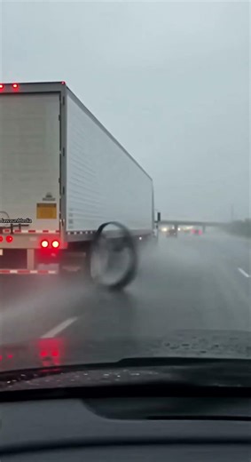 Flying Tire Debris Smashes Windshield on Rainy Highway 🛣️