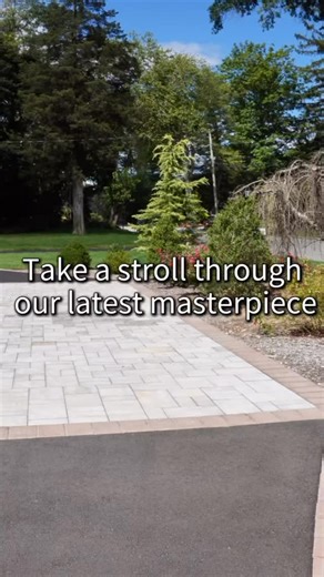 Take a stroll through our latest masterpiece ✨ Every step on Nicolock Paving Stones brings timeless style and unmatched durability to your outdoor space. 🌿🏡 For more inspiration, visit our project gallery today! - #Nicolock #BackyardDesign #OutdoorOasis #PatioGoals #PavingStones #DreamBackyard #LandscapeDesign #BackyardMakeover #HardscapeDesign #BackyardInspiration | Nicolock Paving Stones with Paver-Shield