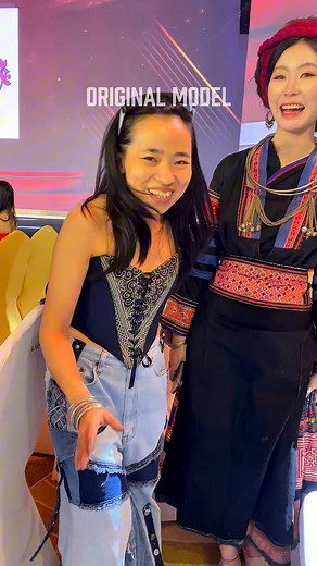 The other day someone told me my work was “not realistic” and “lacked purpose.” My pride took a tiny hit, so today I’m showing you everything as is no filters, no retouching, no fancy lighting. Just reality. Let me clarify a few things: I am real. My height is real. My skin tone is real. My hair is real. My teeth… also real. Outfit? Real, with authentic hand embroidery. Dark crimson yarn? Real color, not app enhanced. Wig? Looks very real. Model? A real Hmong woman, looking stunning in real life