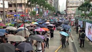 3:36pm Oct.12 - Marchers chant “Liberate HK, revolution of our times!” and “Hong Kong people, rebel!” | Asia Times - Hong Kong