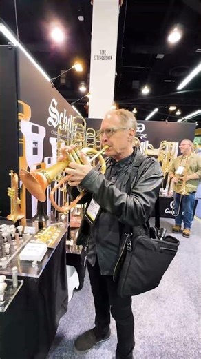 Testing out trumpets at NAMM 2026