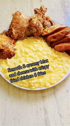 Smooth & creamy Mac and cheese with crispy fried chicken & fries