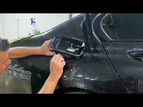 How to remove gas door assembly on BMW