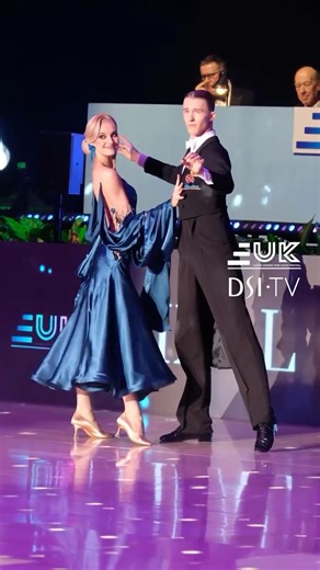 DSI TV on Instagram: "That’s one way to make an entrance 💥 DSI Elite Performers @glennrichardboyce1 & @carolyjanes Professional Ballroom presentation dance 💙 📺 To watch more like this, subscribe to DSI TV! To have your very own couture look like Glenn and Caroly, message @dsilondon and @dsi_dresses ✨ #dsitv #dsilondon #dsieliteperformers #ballroomdance #dancecompetition"