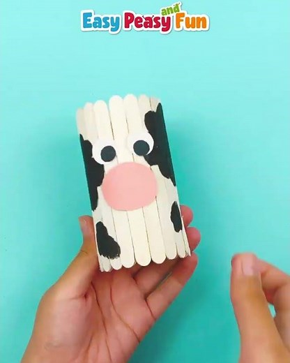 Cow Craft Made With Paper Roll and Craft Sticks