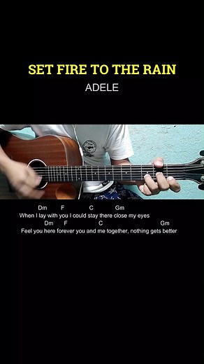 2.8K views · 64 reactions | Set Fire To The Rain - Adele | Easy Guitar Tutorial with Chords and Lyrics #reels | Boss Biong | Facebook