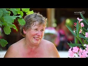 A woman discovers naturism at a club in a city pool