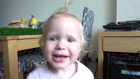 Baby’s gentle moments with her adorable dogs