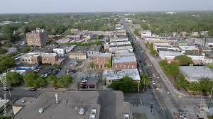 Downtown Ypsilanti, Michigan with drone video moving left to right.