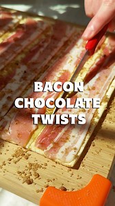 Caramelised Bacon Chocolate Puff Twists 🍫🥓 Trust us on this one... they might sound like an unlikely pairing, but chocolate and bacon absolutely revolutionise these puff pastry twists. Just think about it. We all know bacon is an absolute winner when combined with sweet flavours, so @chrisdanielcahill has taken that and applied it to this absolutely 🐐 snack. Crispy pastry is loaded with caramelised bacon, drizzled with dark chocolate, and finished with a cheeky sprinkle of sea salt. Serve ‘em