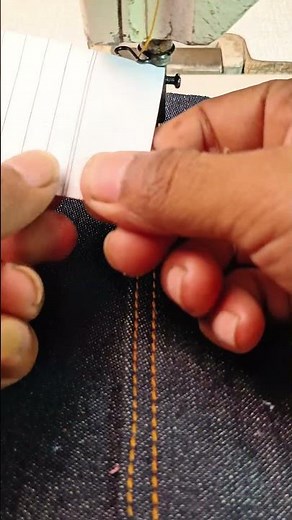 easy way to insert thread into a sewing machine needle