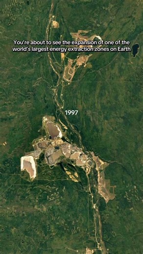 Geocast on Instagram: "The Athabasca oil sands in northern Alberta sit atop one of the largest proven oil reserves on Earth. Since the mid-1980s, this region has expanded from a handful of mining sites into one of the world’s largest energy extraction zones, visible from space. Vast open-pit mines, processing plants, roads, and tailings ponds spread outward as global demand for oil grew and Canada emerged as a major energy producer. This expansion has played a central role in Canada’s economy, s