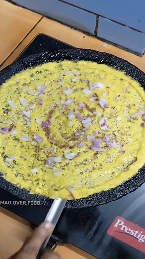 Mad Over Food on Instagram: "Crispy Yellow Moong Daal Dosa Recipe 😋❤️. 1. Wash and Soak 1 cup Moong daal overnight or atleast 5-6 hours. This makes the daal easy to digest , so don't make it instantly. 2. Take the soaked daal into a mixer jar. Add garlic, ginger and Green chillies, salt, 1/2 cup rice flour. Grind it into a coarse paste using water little by little. 3. To this batter add 1/2 tsp turmeric and 1/2 tsp baking soda. Mix it well. 4. Prepare dosas as shown on hot tawa . You can add cu