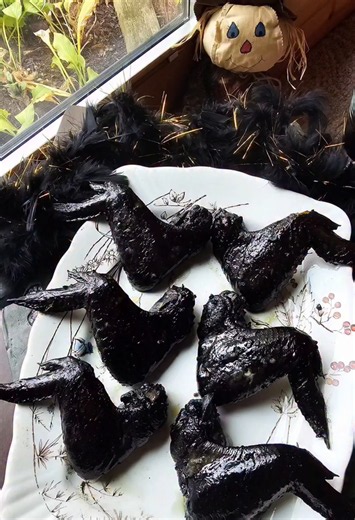 Baked bat wings with bloody dipping sauce