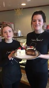 On the Fourth Day of Christmas Ettore's gives to you 15% off all cake slices. Just mention the 12 Days of Christmas at the register. Press play to see Lily and Sterling tell you about it. | Ettore's Bakery & Cafe