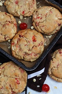 Bakewell NYC Cookies 🍒🍪 Giant chunky Bakewell NYC Cookies stuffed with almond flakes, white chocolate chips and glacé cherries! I am obsessed with bakewell NYC cookies and I love them so so much! ☺️ The marriage of a vanilla and almond cookie dough, stuffed with white chocolate chips, toasted flaked almonds, and chopped glacé cherries is just SO GOOD. If you like the Bakewell theme you will love these! ❤️ 🍒 Recipe 🍒 Ingredients ▪️125 g Unsalted Butter ▪️100 g Light Brown Sugar ▪️75 g White G