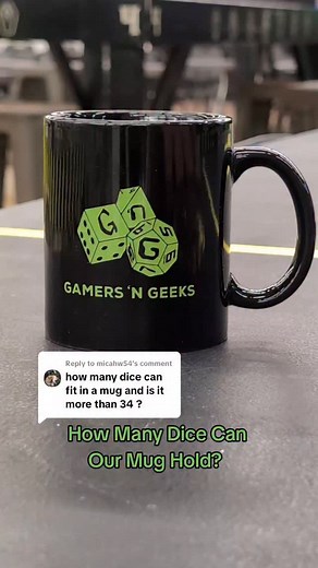  How many dice fit in a Gamers N Geeks mug? We had to find out — so we filled one up! The answer: about 80 dice (plus the mug is yours to keep) for just $35. That’s a lot of click-clack satisfaction for your next game night. Stop by, grab a mug, and see if you can beat our record — how many dice can you fit?  Drop your guesses or your favorite color combo below! | Gamers N Geeks | Facebook
