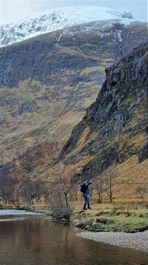 The Glen Nevis Rope Bridge in Scotland is a narrow swinging bridge high above the river, with mountain views that make it feel like a real adventure crossing. #travel #scotland | UK Hidden Gems