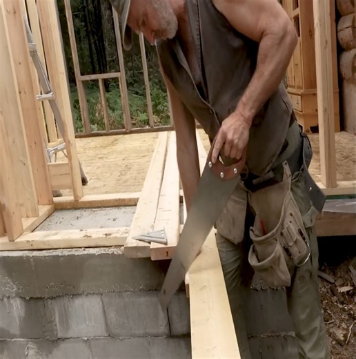Framing the roof by itself to create a bedroom addition to the log cabin. | Building Skills