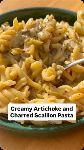Here’s how to make @carolinagelen’s Creamy Artichoke and Charred Scallion Pasta: • 50 scallions (6 or so bunches), root ends trimmed • 2 tablespoons avocado oil, sunflower seed oil or grapeseed oil • 1 pound gemelli, fusilli or other short pasta • Salt and black pepper • 2 (14-ounce) cans quartered artichoke hearts, drained and halved • 2 lemons, zested and juiced (about ¼ cup juice) • 1½ cups/6 ounces finely grated Parmesan Bring a large pot of water to a boil over high. Heat a large, heavy ski