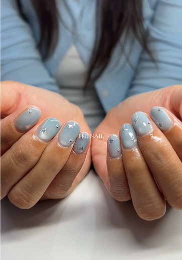 Stunning Blue Nail Art with Star Designs