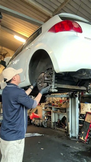 Replace the two rear brake pads on a Toyota Corolla
