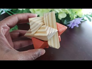 how to solve a 3d wooden star brain teaser! easy and simple way of solving 3d star puzzle!