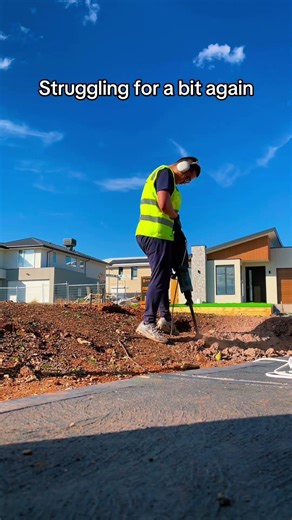 Using a jack hammer for the first time for DIY rock removal