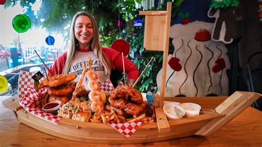 "Where does it fit?" - Woman eats a seafood platter meant to serve 8