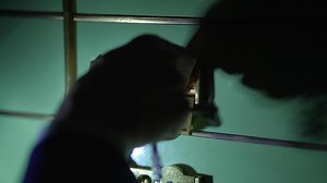 Ensuring the safety of financial assets by securing access to and safeguarding a bank vault locker