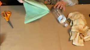 Creating a beautiful farmhouse-style fall corn craft uisng an empty bottle of water. #craftcommunity #fallcrafts #upcycleddecor | Burlap Kitchen