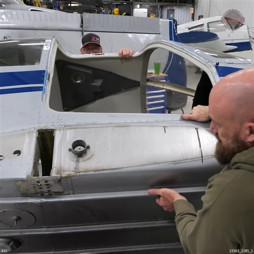 We had to flip our Piper PA-28 235 on its side to access some of the belly that was damaged. We hooked it to our hangar crane and slowly rotated it to reveal the damaged area. | Rebuild Rescue