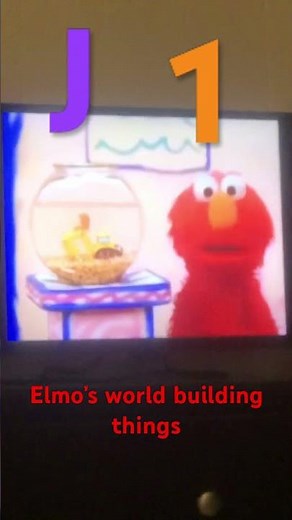 J 1 Elmo’s world building things