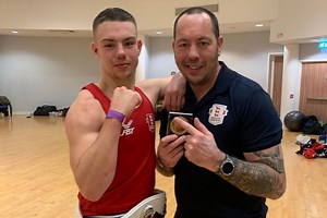 Teenage boxer follows in dad’s footsteps after winning national championship