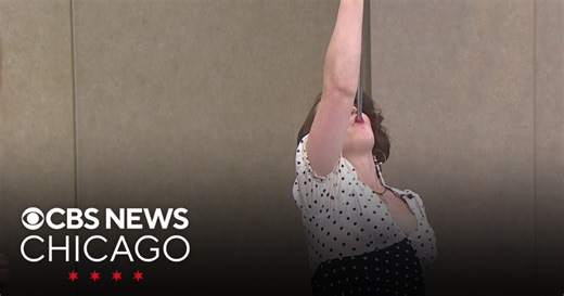 Sideshow Gelato's sword swallower live on CBS News Chicago