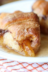 Full Recipe: https://bellyfull.net/2019/03/27/easy-peach-dumplings/ These Easy Peach Dumplings (using fresh or canned peaches) are soft and gooey on the bottom, but crispy on top, and taste like peach cobbler. Crazy easy and ridiculously delicious! | Belly Full