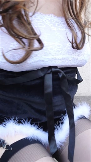 Black garter belt stockings ,panties, micro dress White high heels T-Lady on the stairs | Sissymaid Pl