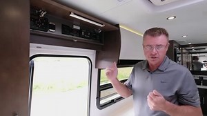 Enjoy a guided tour through the 2021 Unity Murphy Bed featuring the optional patented Leisure Lounge Plus, a 68" × 76" bed, a three-piece dry bathroom with large stand-up shower, a 39" pop-up LED TV, built-in subwoofer, sound bar with streaming Bluetooth, optional lithium batteries, and abundant storage. https://leisurevans.com/build/unity/ | Leisure Travel Vans