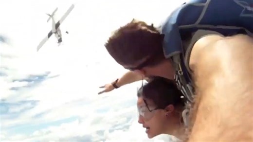 The plane missed them by inches but still destroyed their main parachute