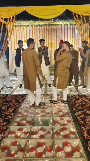 Traditional South Asian Attire at a Colorful Gathering