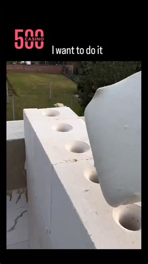 ENTERTAINMENT on Instagram: "The post's video demonstrates a DIY hack: injecting expanding spray foam into cinder block wall voids, then smoothing it with a trowel for a seamless, insulated finish. Uploaded by @axilaya on October 29, 2025, it amassed 299,000 views and 112 replies within hours, with Indonesian commenters expressing strong interest in trying the method for home renovations. This technique boosts wall insulation by filling air gaps and reducing thermal bridging, cutting energy cost
