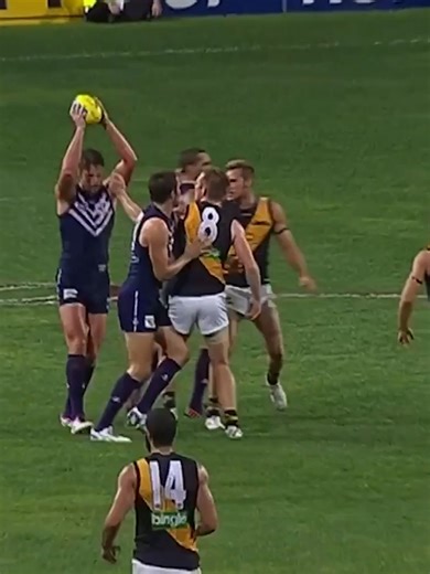 D. Cometti... forever iconic 💜 | Fremantle Dockers