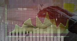 Grid opening chart and emerging line graph while hand grabbing pen jotting notes capturing trends