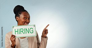 Happy black woman, hiring sign and pointing on mockup for business opportunity against a studio background. Portrait of African female person or employee smile with billboard for recruiting or career