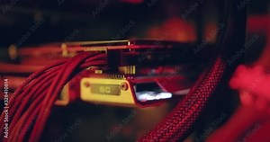 A man inserts an ATX PCI-E PCIe 8 Pin power connector and launches a video card