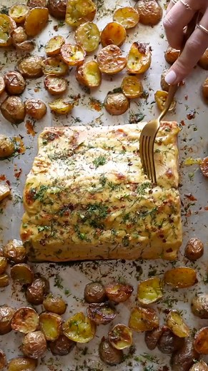 Simple and delicious salmon and potatoes roasted on a sheet pan, and covered in a garlic dill butter sauce! One of my family’s favorite dinners. https://pinchofyum.com/sheet-pan-salmon-with-dill-potatoes | Pinch of Yum