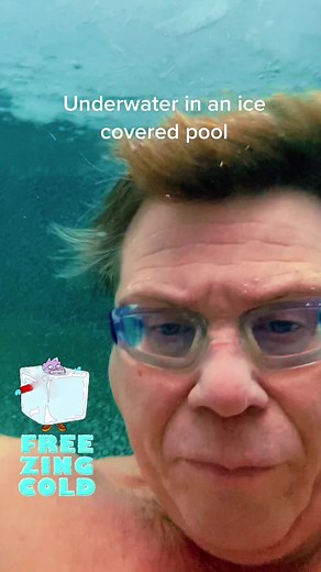 Free diving underwater in an ice covered pool. #undertheice #undertheiceview #underice #undericediving #underwatertiktok #underwaterview