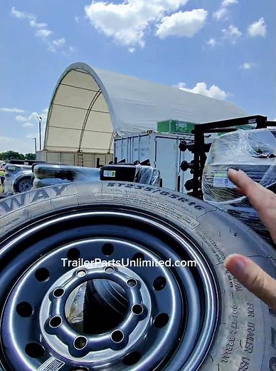 16” 16-ply LRH trailer tire on black mod 8 lug wheel