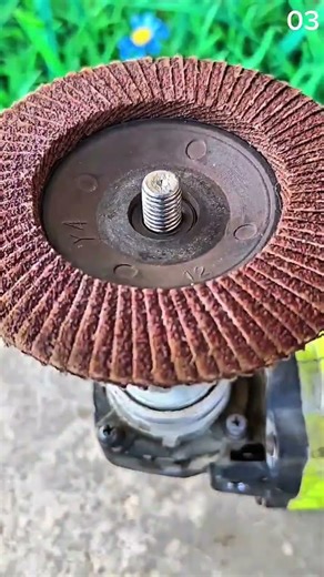 Rust yields to grind—morning metal breathes beneath spinning light